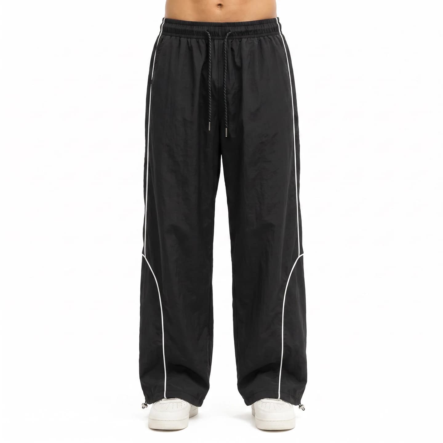 Curved Piping Track Pants in Black, relaxed men's fit