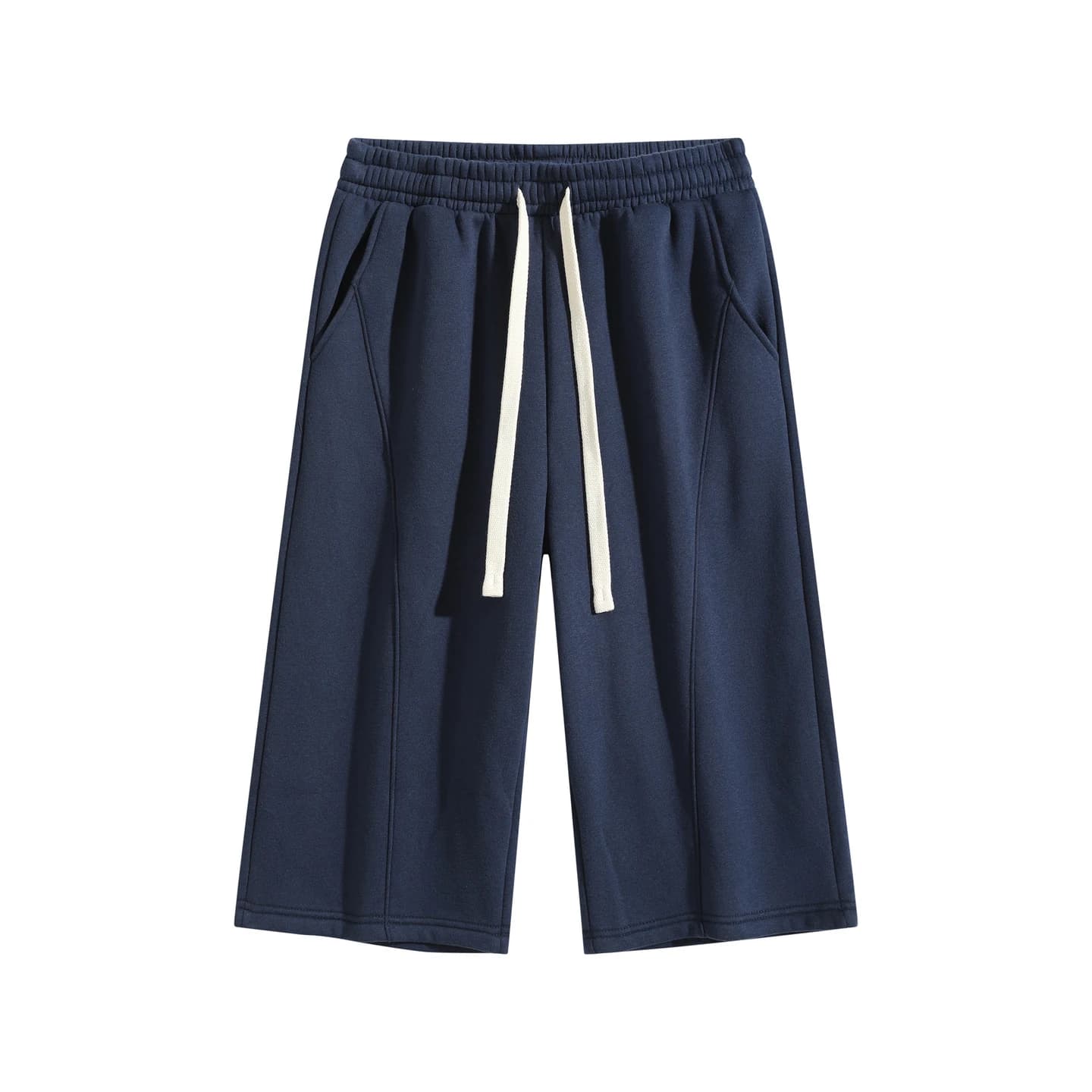 Curved-Seam Longline Shorts in Navy, front flat lay